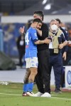 Napoli's Lorenzo Insigne, left, celebrates after scoring goal 5-1 with the team's head coach Gennaro Gattuso, during the Serie A soccer match between Napoli and Udinese, at the Diego Armando Maradona stadium in Naples, Italy, Tuesday, May 11, 2021. (Fabrizio Corradetti/LaPresse via AP)
