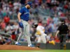 Toronto Blue Jays pitcher Robbie Ray, left, waits for Atlanta Braves' Ronald Acuna Jr. to run the bases after giving up a home run to Acuna in the third inning of a baseball game Tuesday, May 11, 2021, in Atlanta. (AP Photo/Ben Margot)
