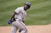 FKILE - Texas Rangers' Adolis Garcia celebrates his three-run home run during the eighth inning of a baseball game against the Los Angeles Angels in Anaheim, Calif., in this Wednesday, April 21, 2021, file photo. Garcia said his love for the game is the source of the emotion and passion he has on the field, though even he expressed some sense of amazement at how well things have been gone so far. (AP Photo/Jae C. Hong, File)