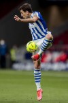 Real Sociedad's Mikel Oyarzabal controls the ball during the Spanish La Liga soccer match between Atletico Madrid and Real Sociedad at the Wanda Metropolitano stadium in Madrid, Spain, Wednesday, May 12, 2021. (AP Photo/Bernat Armangue)