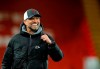 Liverpool's manager Jurgen Klopp celebrates at the end of the English Premier League soccer match between Liverpool and Southampton at Anfield stadium in Liverpool, England, Saturday, May 8, 2021. (Phil Noble/Pool via AP)
