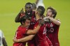 Toronto FC forward Jozy Altidore, center, celebrates after scoring a goal against the Columbus Crew with teammates from left, forward Tsubasa Endoh, defender Omar Gonzalez and forward Patrick Mullins during the second half of an MLS soccer match, Wednesday, May 12, 2021, in Orlando, Fla. (AP Photo/John Raoux)