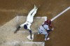 Milwaukee Brewers' Lorenzo Cain scores past St. Louis Cardinals catcher Yadier Molina during the sixth inning of a baseball game Wednesday, May 12, 2021, in Milwaukee. Cain scored from second on a ball hit by Travis Shaw. (AP Photo/Morry Gash)