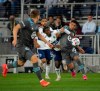 Minnesota United midfielder Emanuel Reynoso (10) and Vancouver Whitecaps midfielder Janio Bikel (19) battle for the ball during the first half of an MLS soccer match, Wednesday, May 12, 2021 in St. Paul, Minn. (Jeff Wheeler/Star Tribune via AP)