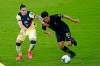 Los Angeles FC forward Carlos Vela (10) moves the ball past Club America defender Jorge Sanchez (3) during the second half of a CONCACAF Champions League soccer match, Sunday, Dec. 20, 2020, in Orlando, Fla. THE CANADIAN PRESS/AP/John Raoux