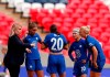 FILE - In this Saturday, Aug. 29, 2020 file photo, Chelsea manager Emma Hayes, left, gives instructions to her players during their English FA Women's Community Shield soccer match against Manchester City at Wembley stadium in London. Chelsea can reach its first Women’s Champions League final if it gets a better performance in the attacking third against Bayern Munich on Sunday, May 2, 2021. Chelsea manager Emma Hayes says her team didn't do well “in the finishing phase” last week in a 2-1 loss to Bayern in the first leg of the semifinals. (Andrew Couldridge/Pool via AP, file)
