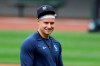 FILE - Seattle Mariners outfielder Jarred Kelenic walks on the field at a 