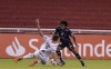 Jose Hurtado of Ecuador's Independiente del Valle, right, and Renan of Brazil's Palmeiras battle for the ball during a Copa Libertadores soccer match in Quito, Ecuador, Tuesday, May 11, 2021. (Franklin Jacome/Pool via AP)