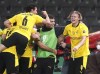 Dortmund's Erling Haaland, right, celebrates after scoring his side's fourth goal during the German soccer cup (DFB Pokal) final match between RB Leipzig and Borussia Dortmund in Berlin, Germany, Thursday, May 13, 2021. (AP Photo/Michael Sohn, Pool)