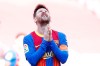 Barcelona's Lionel Messi reacts after a missed scoring opportunity during the Spanish La Liga soccer match between FC Barcelona and Atletico Madrid at the Camp Nou stadium in Barcelona, Spain, Saturday, May 8, 2021. (AP Photo/Joan Monfort)