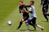 CF Montreal midfielder Djordje Mihailovic, left, and Vancouver Whitecaps midfielder Caio Alexandre, right, battle for the ball in first half MLS soccer action in Sandy, Utah, Saturday, May 8, 2021. Alexandre says he and his Vancouver Whitecaps teammates need to be deadly in front of the net if they want to accomplish their goals this season. THE CANADIAN PRESS/AP-Rick Bowmer