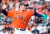 Houston Astros starting pitcher Zack Greinke throws to Texas Rangers' Nate Lowe in the top of the first inning of a baseball game Friday, May 14, 2021, in Houston. (Kevin M. Cox/The Galveston County Daily News via AP)