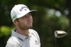 Sam Burns watches his tee shot on the second hole during the third round of the AT&T Byron Nelson golf tournament, Saturday, May 15, 2021, in McKinney, Texas. (AP Photo/Tony Gutierrez)