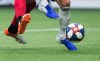 Toronto FC's Terrence Boyd, left, and Vancouver Whitecaps' Scott Sutter vie for the ball during the second half of an MLS soccer game in Vancouver on Friday May 31, 2019. THE CANADIAN PRESS/Darryl Dyck