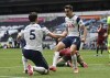 Tottenham Hotspur's Pierre-Emile Hojbjerg, left, celebrates with teammates after scoring their second goal during the English Premier League soccer match between Tottenham Hotspur and Wolverhampton Wanderers at Tottenham Hotspur Stadium in London, England, Sunday, May 16, 2021. (AP Photo/Shaun Botterill, Pool)