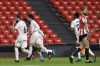 Real Madrid's Nacho, left, celebrate his side goal with his fellow teammate team during Spanish La Liga soccer match between Athletic Bilbao and Real Madrid at San Mames stadium, in Bilbao, northern Spain, Sunday, May 16, 2021. (AP Photo/Alvaro Barrientos)