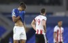 Everton's Dominic Calvert-Lewin reacts disappointed after the English Premier League soccer match between Everton and Sheffield United at Goodison Park in Liverpool, England, Sunday, May 16, 2021. (Alex Pantling/Pool via AP)