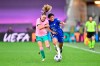 Barcelona's Caroline Graham Hansen, left, fights for the ball with Chelsea's Jessica Carter during the UEFA Women's Champions League final soccer match between Chelsea FC and FC Barcelona in Gothenburg, Sweden, Sunday, May 16, 2021. (AP Photo/Martin Meissner)