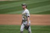 Oakland Athletics pitcher Chris Bassitt reacts after Minnesota Twins' Max Kepler hit a three-run home run during the second inning of a baseball game, Sunday, May 16, 2021, in Minneapolis. (AP Photo/Craig Lassig)