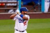 Los Angeles Dodgers' Albert Pujols bats during the first inning of a baseball game against the Arizona Diamondbacks Monday, May 17, 2021, in Los Angeles. (AP Photo/Mark J. Terrill)
