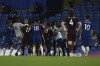 Leicester City and Chelsea players clash during the English Premier League soccer match between Chelsea and Leicester City at Stamford Bridge Stadium in London, Tuesday, May 18, 2021. (Glyn Kirk/Pool via AP)