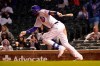 Chicago Cubs' Kris Bryant watches his RBI single off Washington Nationals starting pitcher Patrick Corbin during the fifth inning of a baseball game Tuesday, May 18, 2021, in Chicago. (AP Photo/Charles Rex Arbogast)