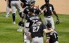 Chicago White Sox players celebrate after beating the Minnesota Twins 2-1 in a baseball game, Wednesday, May 19, 2021, in Minneapolis. (AP Photo/Jim Mone)