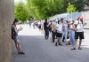 Families and youth aged 12 and older line up for a COVID-19 vaccine at Gordon A Brown Middle School in Toronto Wednesday May 19, 2021. THE CANADIAN PRESS/Nathan Denette