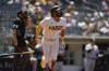 San Diego Padres' Fernando Tatis Jr. watches his home run hit during the fourth inning of a baseball game against the Colorado Rockies, Wednesday, May 19, 2021, in San Diego. (AP Photo/Gregory Bull)