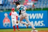 Miami Marlins' Brian Anderson, right, rounds the bases after hitting a home run off Philadelphia Phillies pitcher Zach Eflin during the second inning of a baseball game, Wednesday, May 19, 2021, in Philadelphia. (AP Photo/Matt Slocum)