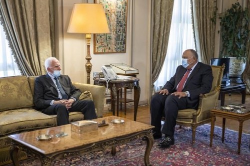 Egyptian Foreign Minister Sameh Shoukry, right, meets with Palestinian Fatah official Azzam Al-Ahmad at the foreign ministry in Cairo, Thursday, May 20, 2021. (AP Photo/Nariman El-Mofty)