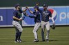 Tampa Bay Rays outfielders Austin Meadows, left, Brett Phillips, center, and Kevin Kiermaier celebrate after defeating the Baltimore Orioles during a baseball game, Thursday, May 20, 2021, in Baltimore. The Rays won 10-1. (AP Photo/Julio Cortez)