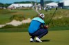 Cameron Smith, of Australia, reacts to a putt on the 11th hole during the first round of the PGA Championship golf tournament on the Ocean Course Thursday, May 20, 2021, in Kiawah Island, S.C. (AP Photo/Matt York)