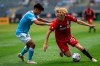 New York FC forward Andres Jasson, left, fights for the ball against Toronto FC's Jacob Shaffelburg during an MLS soccer match at Yankee Stadium on, Saturday, May15, 2021. in New York. THE CANADIAN PRESS/AP/Eduardo Munoz Alvarez)