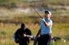 Louis Oosthuizen, of South Africa, tosses his club after a poor shot on the 18th hole during the second round of the PGA Championship golf tournament on the Ocean Course Friday, May 21, 2021, in Kiawah Island, S.C. (AP Photo/Chris Carlson)
