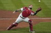 St. Louis Cardinals catcher Yadier Molina catches a pop up in foul territory by Chicago Cubs' Joc Pederson for an out during the eighth inning of a baseball game Friday, May 21, 2021, in St. Louis. (AP Photo/Jeff Roberson)