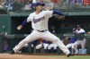 Texas Rangers starting pitcher Kohei Arihara throws against the Seattle Mariners in the first inning of a baseball game Saturday, May 8, 2021, in Arlington, Texas. (AP Photo/Louis DeLuca)