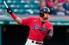 Cleveland Indians' Cesar Hernandez watches his two-run home run in the 10th inning of a baseball game against the Minnesota Twins, Saturday, May 22, 2021, in Cleveland. (AP Photo/Tony Dejak)