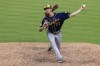 Milwaukee Brewers' Josh Hader throws during the ninth inning of a baseball game against the Cincinnati Reds in Cincinnati, Saturday, May 22, 2021. The Brewers won 4-3. (AP Photo/Aaron Doster)