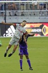 Toronto FC defender Omar Gonzalez, left, and Orlando City forward Tesho Akindele battle for position for a head ball during the first half of an MLS soccer match, Saturday, May 22, 2021, in Orlando, Fla. (AP Photo/John Raoux)
