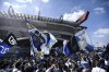 Inter Milan's supporters celebrate their team's Serie A title prior to the Serie A soccer match between Inter and Udinese, at the San Siro stadium in Milan, Italy, Sunday, May 23, 2021. Inter won its first Serie A title in 11 years this month. (Piero Cruciatti/LaPresse via AP)