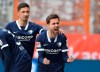 Bochum's Milos Pantovic, right, celebrates after scoring his side's opening goal during the German 2. Bundesliga match between VfL Bochum and SV Sandhausen in Bochum, Germany, Sunday, May 23, 2021. (Guido Kirchner/dpa via AP)