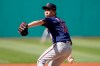 Minnesota Twins starting pitcher Kenta Maeda prepares to deliver in the first inning of a baseball game against the Cleveland Indians, Saturday, May 22, 2021, in Cleveland. (AP Photo/Tony Dejak)