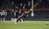 Newcastle United's Fabian Schar scores the second goal of the game during their English Premier League soccer match against Fulham at Craven Cottage, London, Sunday, May 23, 2021. (Glyn Kirk/Pool Photo via AP)