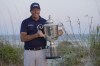 Phil Mickelson holds the Wanamaker Trophy after winning the PGA Championship golf tournament on the Ocean Course, Sunday, May 23, 2021, in Kiawah Island, S.C. (AP Photo/David J. Phillip)