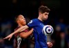 Leicester's Youri Tielemans, left, duels for the ball with Chelsea's Christian Pulisic during the English Premier League soccer match between Chelsea and Leicester City at Stamford Bridge Stadium in London, Tuesday, May 18, 2021. (Peter Cziiborra/Pool via AP)