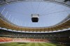 FILE - In this Sunday, April 25, 2021 filer, the video display casts a shadow on the pitch of the National Arena stadium, a venue of the Euro 2020 soccer tournament, in Bucharest, Romania. For players, the pandemic has meant a congested season that poses fitness challenges, let alone trying to avoid coronavirus infections. Financially playing the delayed tournament is essential for UEFA. For fans, the EURO 2020 24-team event should be the first chance for the widespread return of fans to stadiums across Europe since March 2020, assuming new restrictions aren't imposed. (AP Photo/Vadim Ghirda, File)