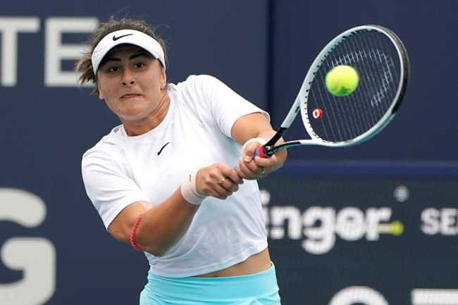 Bianca Andreescu of Canada returns to Ashleigh Barty of Australia during the finals at the Miami Open tennis tournament, Saturday, April 3, 2021, in Miami Gardens, Fla. THE CANADIAN PRESS/AP/Lynne Sladky