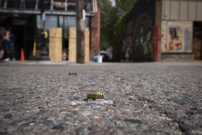 A bullet casing is seen after shots were fired in George Floyd Square on the one year anniversary of George Floyd's death on Tuesday, May 25, 2021, in Minneapolis. The intersection where George Floyd died was disrupted by gunfire Tuesday, just hours before it was to be the site of a family-friendly street festival marking the anniversary of his death at the hands of police.(AP Photo/Christian Monterrosa)