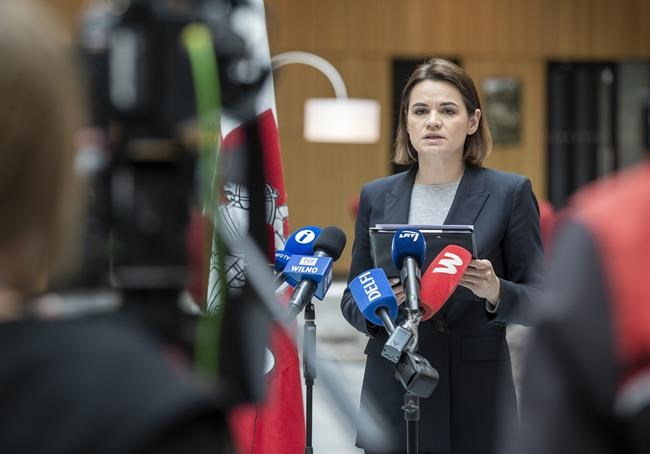 Belarusian opposition leader Sviatlana Tsikhanouskaya speaks during her news conference in Vilnius, Lithuania, Tuesday, May 25, 2021. On Sunday, a Ryanair jetliner flying from Greece to Lithuania was ordered to land in Belarus escorted by a Belarusian fighter jet and then Belarus authorities detained 26-year-old journalist and activist Raman Pratasevich and his Russian girlfriend who were aboard the plane. The European Union has imposed sanctions over the Belarus actions in forcing the diversion of a passenger jet. (AP Photo/Mindaugas Kulbis)